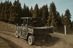 UWolf 1000L carrying logs in the cargo bed
